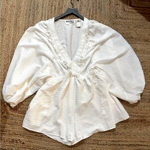 Over sized sleeve romper is so cute